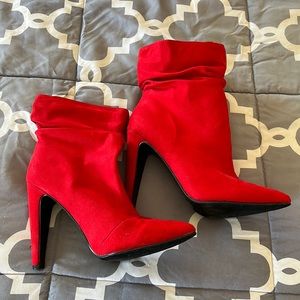 Never worn outside cherry red booties. Size 7
